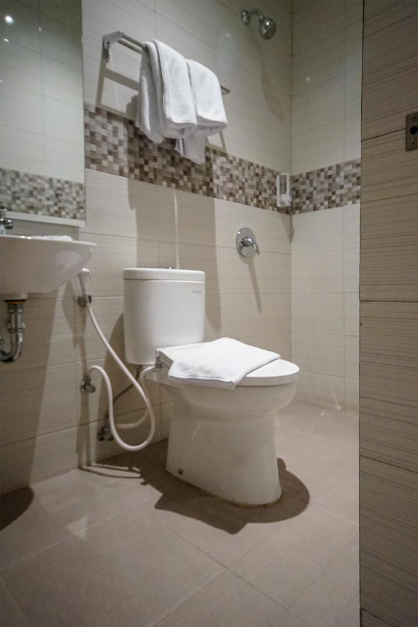 Oyo 344 Kr Hotel Palembang Extérieur photo